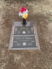 Granite companion flat headstone with attached vase
