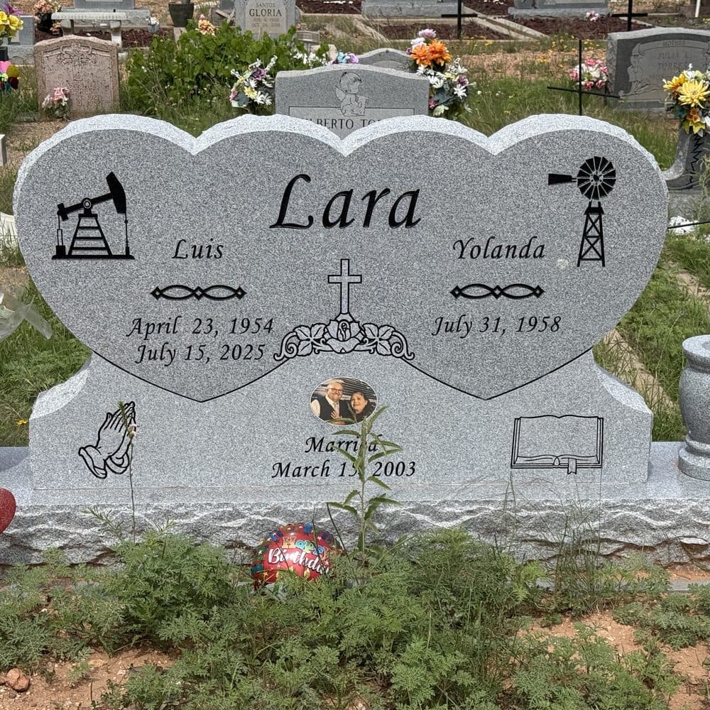 Light granite companion upright monument with color laser-engraved emblems, set at a Texas cemetery