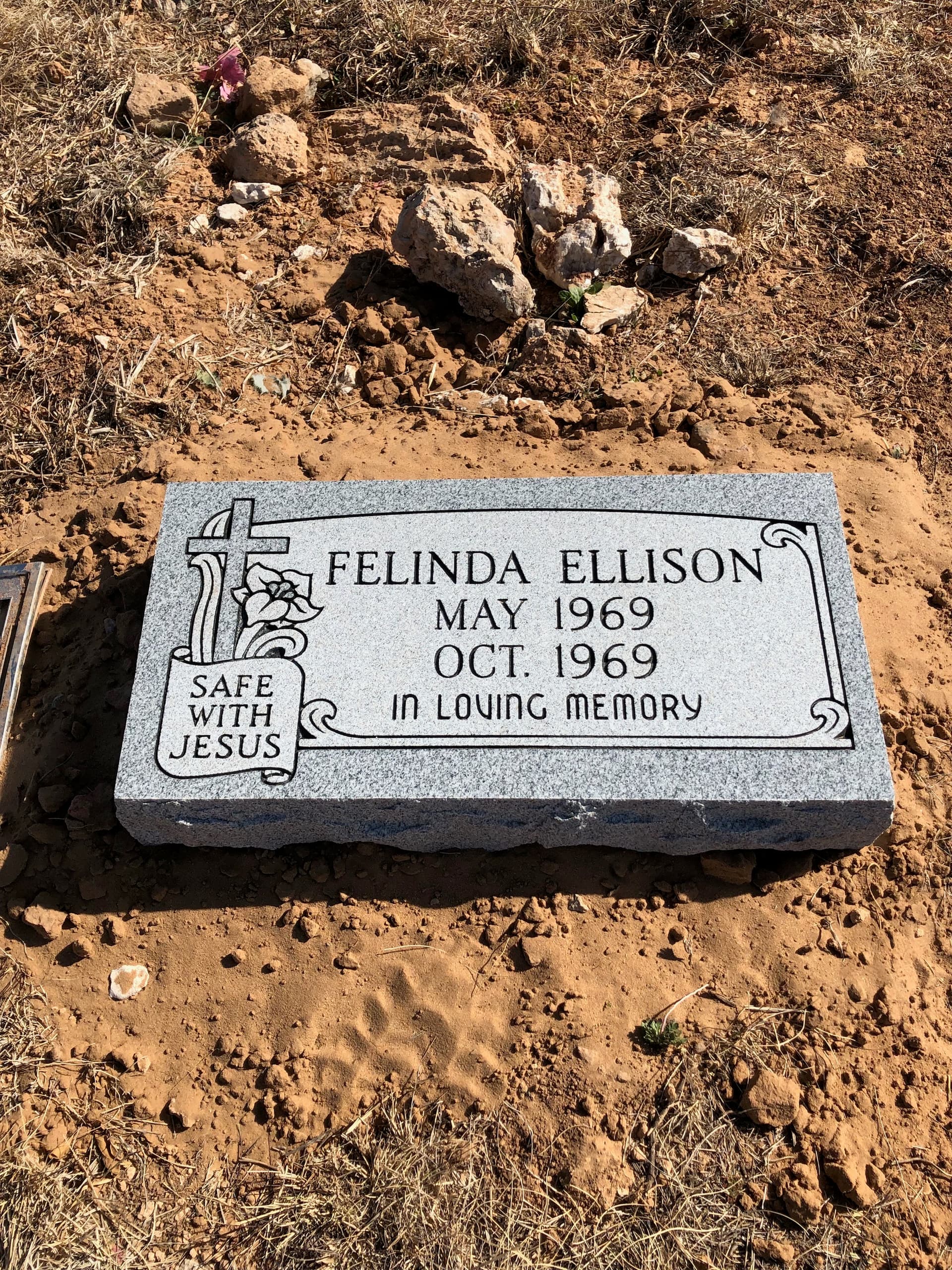 Granite flat headstone with integrated bronze vase