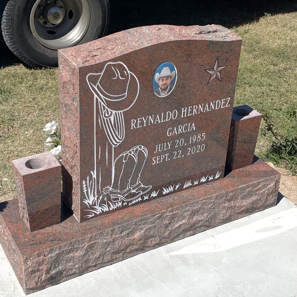 Red granite single upright monument with a laser-engraved portrait, set at a Texas cemetery